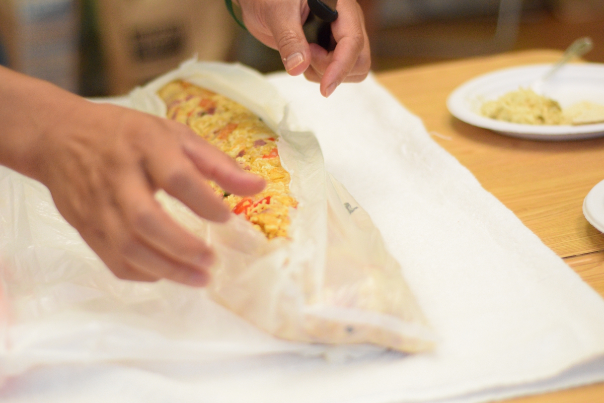 Eddy Zheng reveals the Fritos-ramen-casserole. Photo by Kiwi Illafonte.