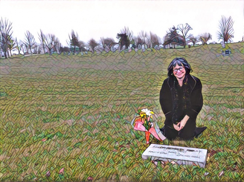 the author at her birth father's grave